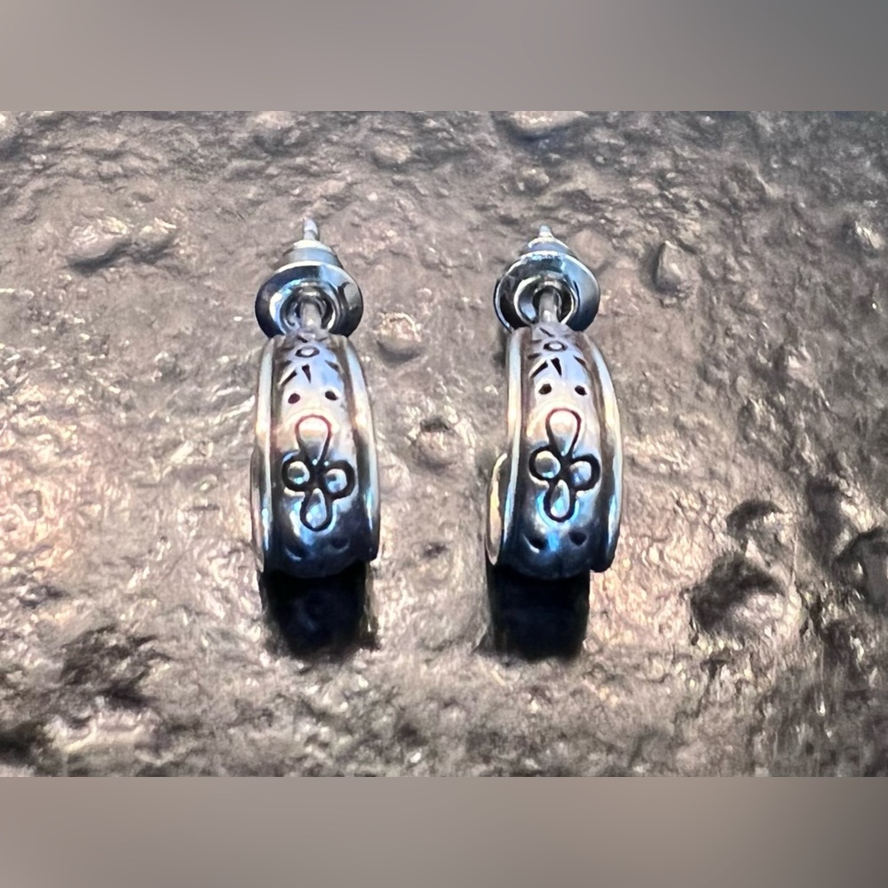 Sundance sterling silver and gold post earrings.